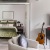 a bedroom with a bed and a chair