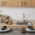 a kitchen with a sink and plates
