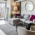 a living room with a large mirror