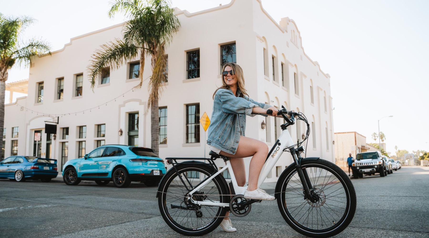 Living like you mean it. girl on bike in city